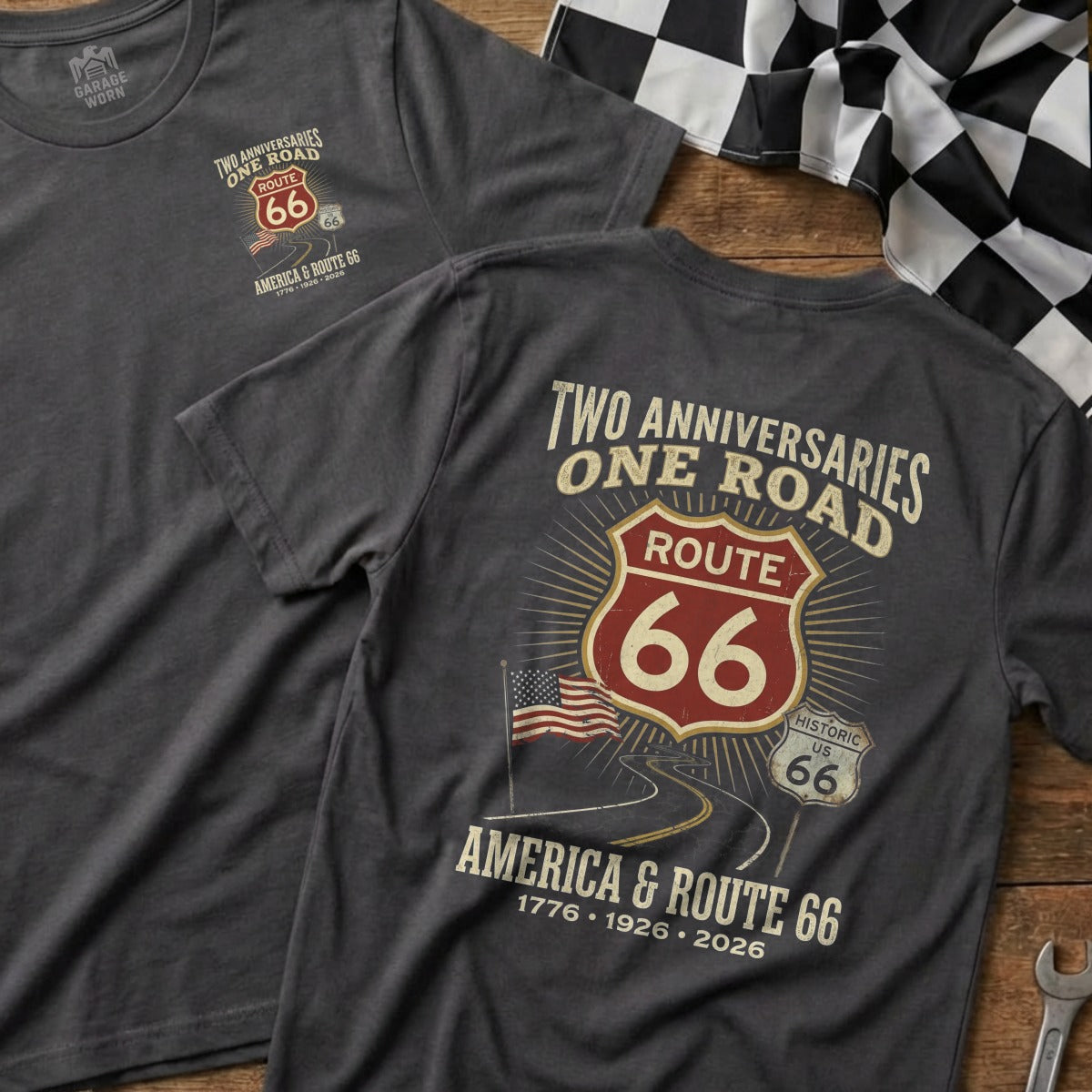 Two dark t-shirts featuring Route 66 anniversary graphic with checkered flag.