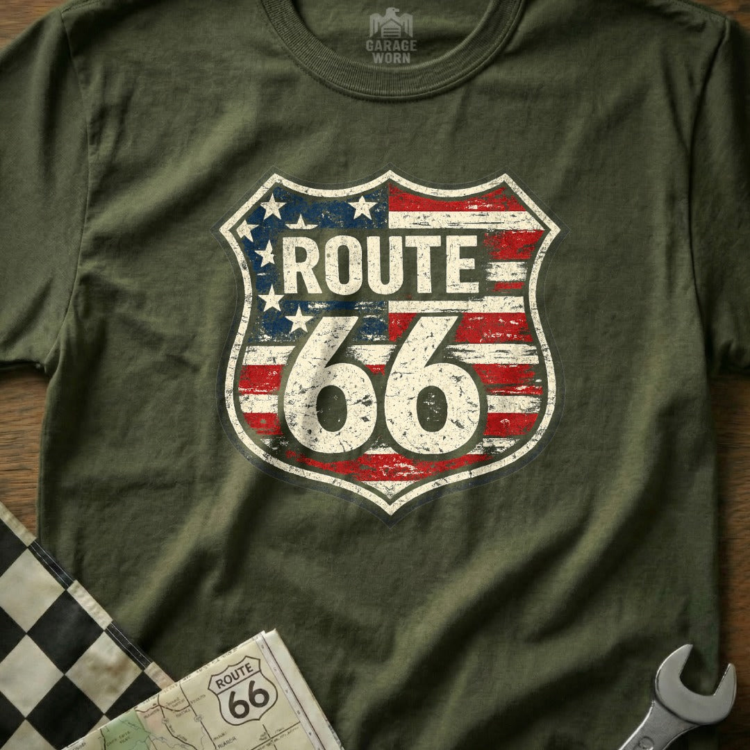 Distressed Route 66 shield logo on an olive green t-shirt.