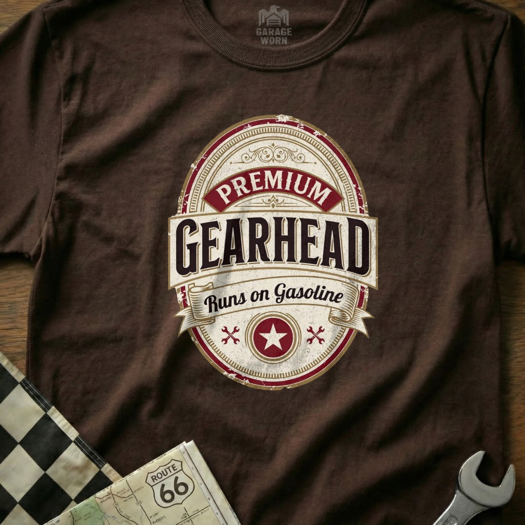 Brown t-shirt with oval "Premium Gearhead Runs on Gasoline" logo.