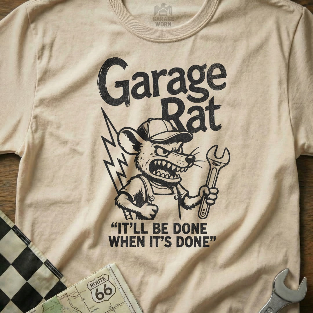 T-shirt with "Garage Rat" text and graphic of a rat mechanic holding a wrench.