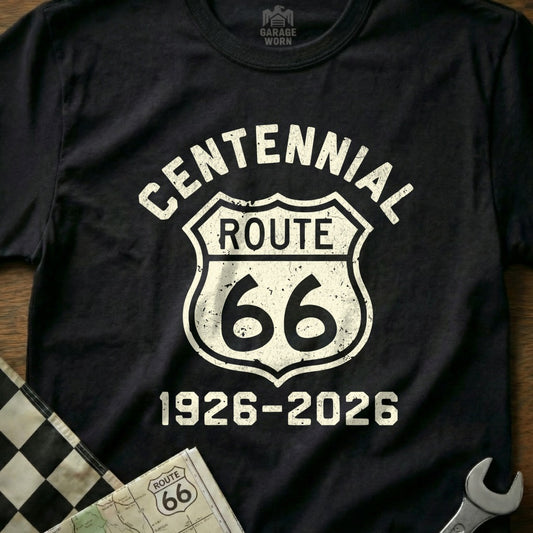 Black t-shirt with white "Centennial Route 66 1926-2026" shield graphic.