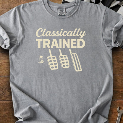Grey t-shirt with "Classically TRAINED" text and clutch, brake, and gas pedals graphic.