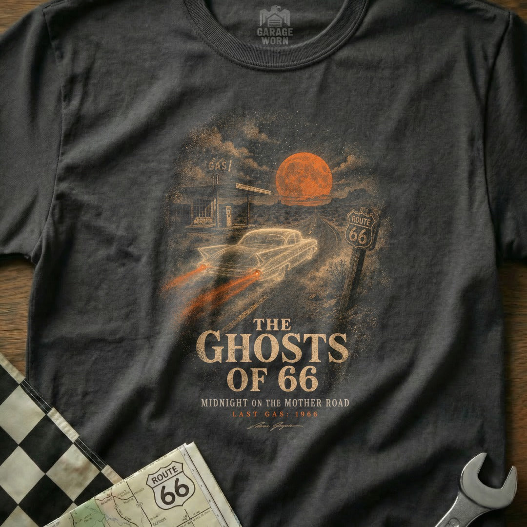 T-shirt graphic: vintage car on Route 66, orange moon, gas station, text "The Ghosts of 66".