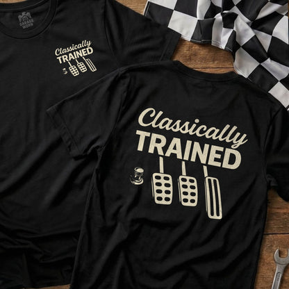 Black t-shirt with "Classically TRAINED" text, pedals, and coffee cup graphic.