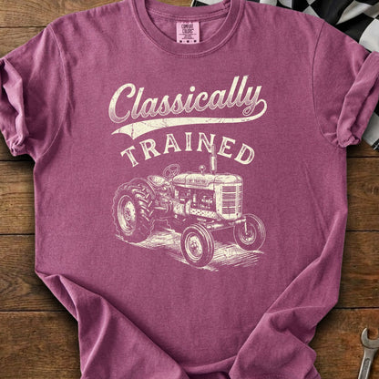 T-shirt with distressed graphic of a vintage tractor and "Classically Trained" text