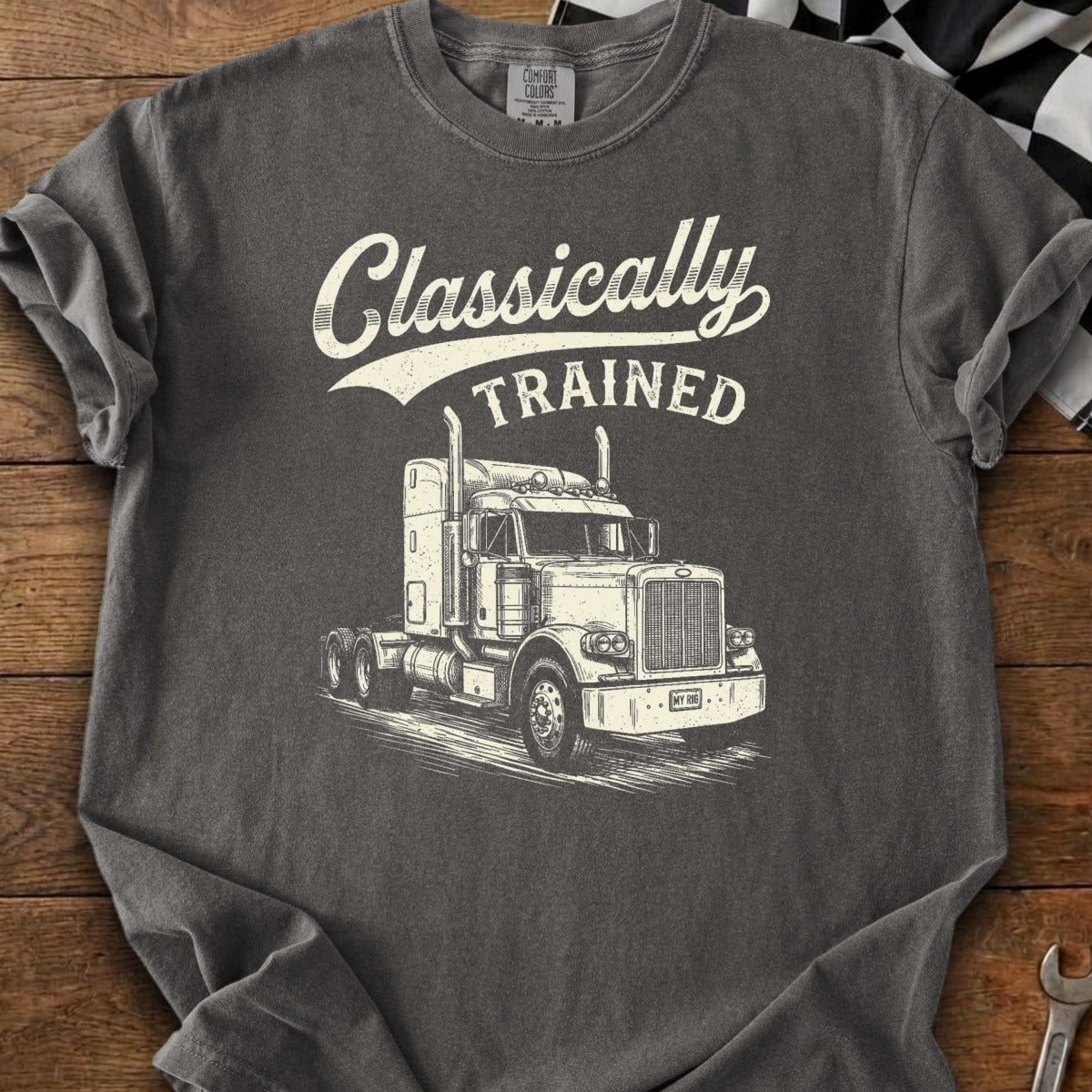 Shirt with "Classically TRAINED" text above a detailed drawing of a semi-truck.