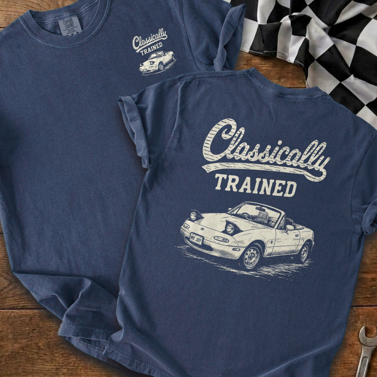 Navy t-shirt with "Classically TRAINED" and a sketch of a convertible car.