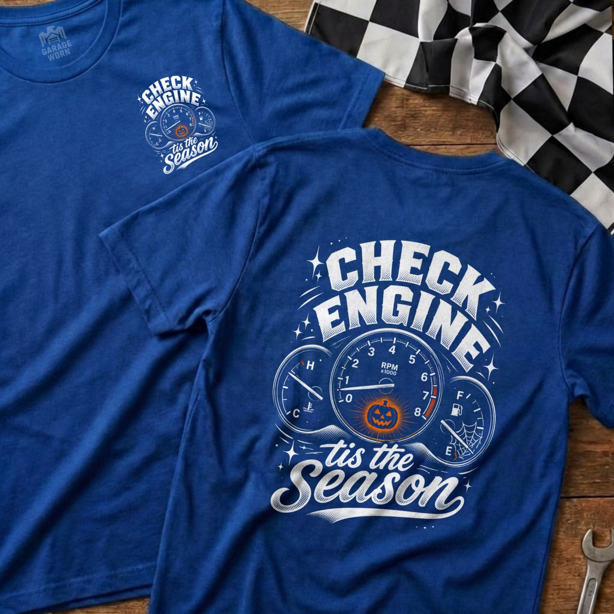 Blue t-shirt with "Check Engine 'tis the Season" graphic and dashboard gauges.