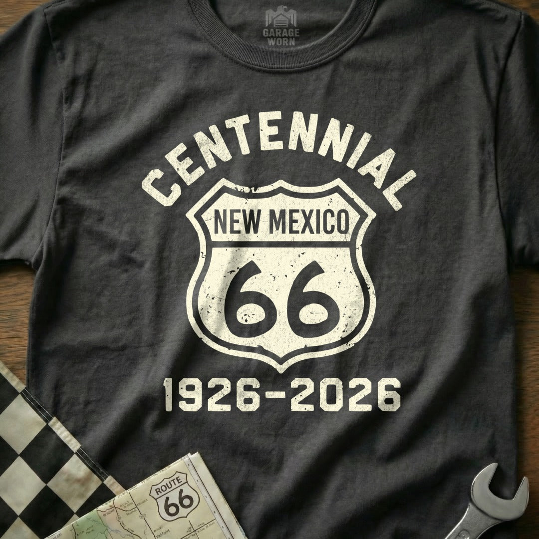Dark grey t-shirt with "Centennial New Mexico 66" and "1926-2026" text.