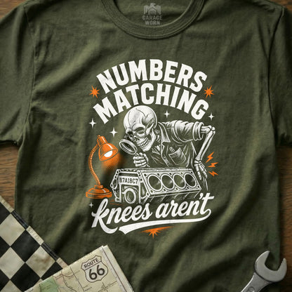 Skeleton inspecting engine block with magnifying glass, "Numbers Matching" text.