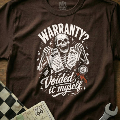 Brown t-shirt graphic: skeleton holds torn warranty papers stating "Voided it myself."