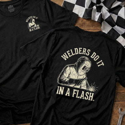 Black t-shirt with "Welders Do It In A Flash" and welder graphic.
