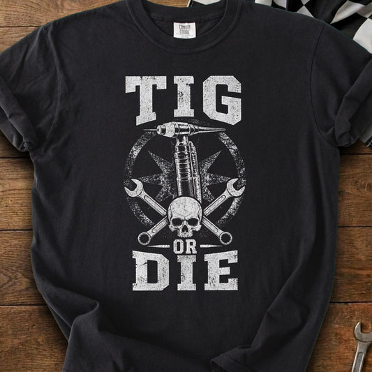Black t-shirt with white distressed graphic of a TIG torch, skull, wrenches, and text.
