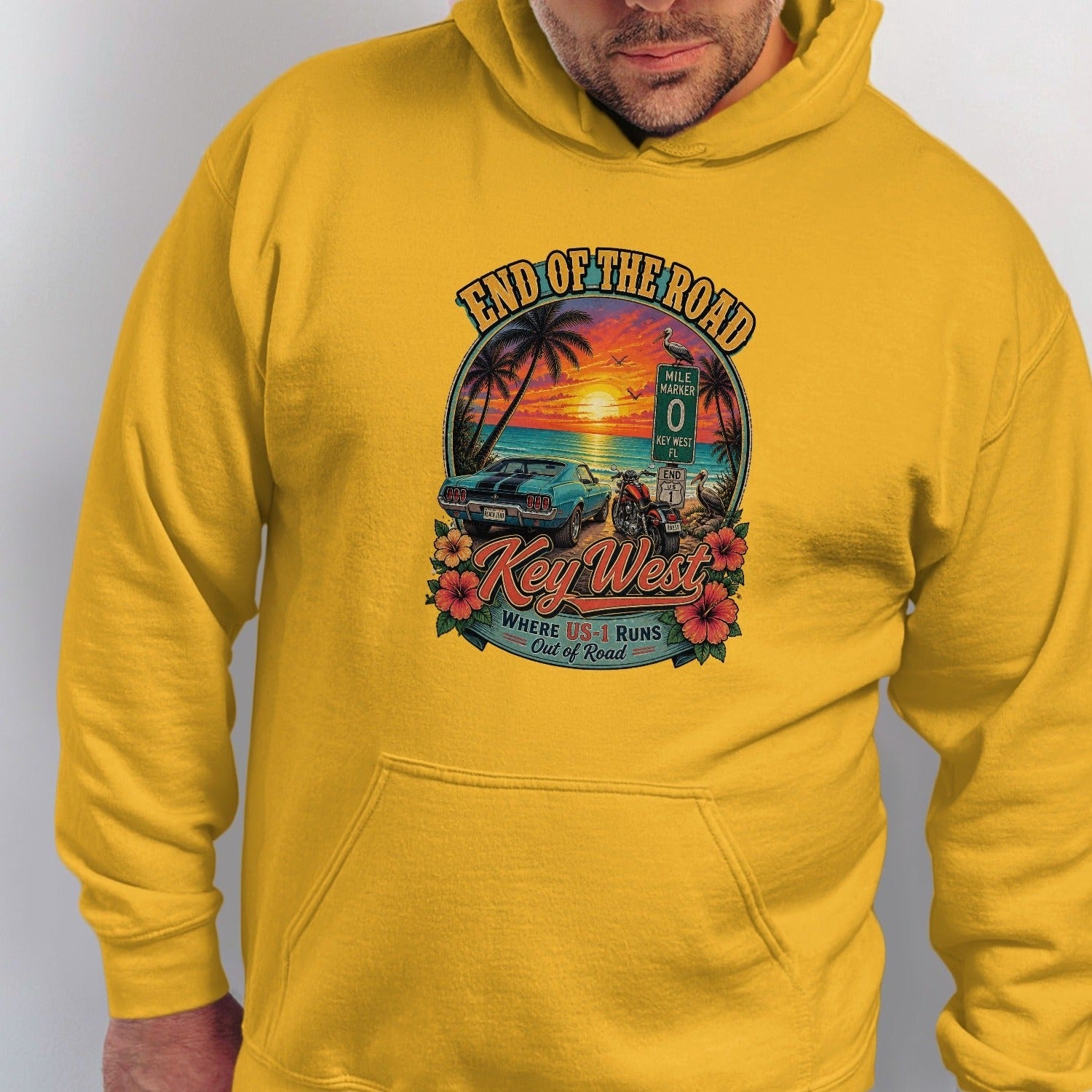 Key West sunset graphic with classic car, motorcycle, and "End of the Road" text.