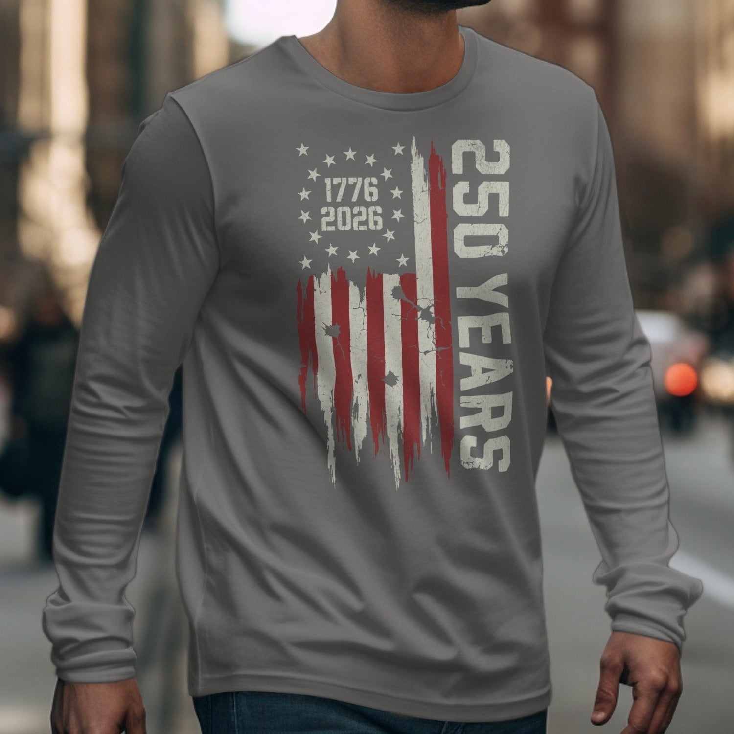Long sleeve shirt with distressed American flag design and text "250 YEARS 1776 2026".