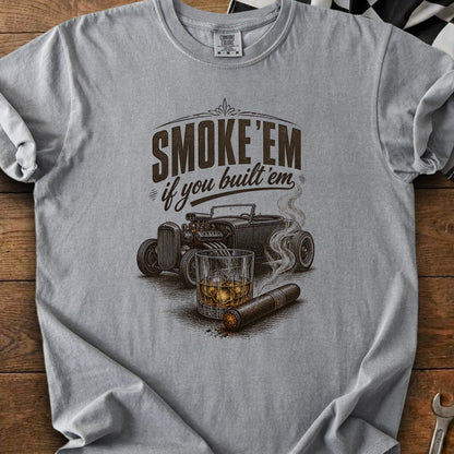T-shirt graphic: "SMOKE 'EM if you built 'em" over a hot rod, whiskey, and cigar.