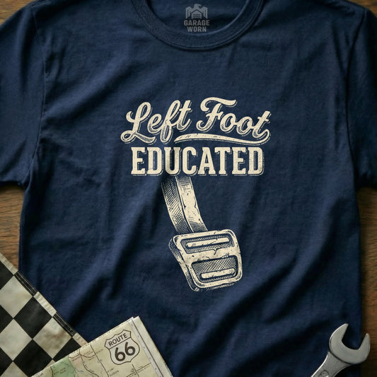 Navy t-shirt with "Left Foot Educated" text and a gas pedal graphic.