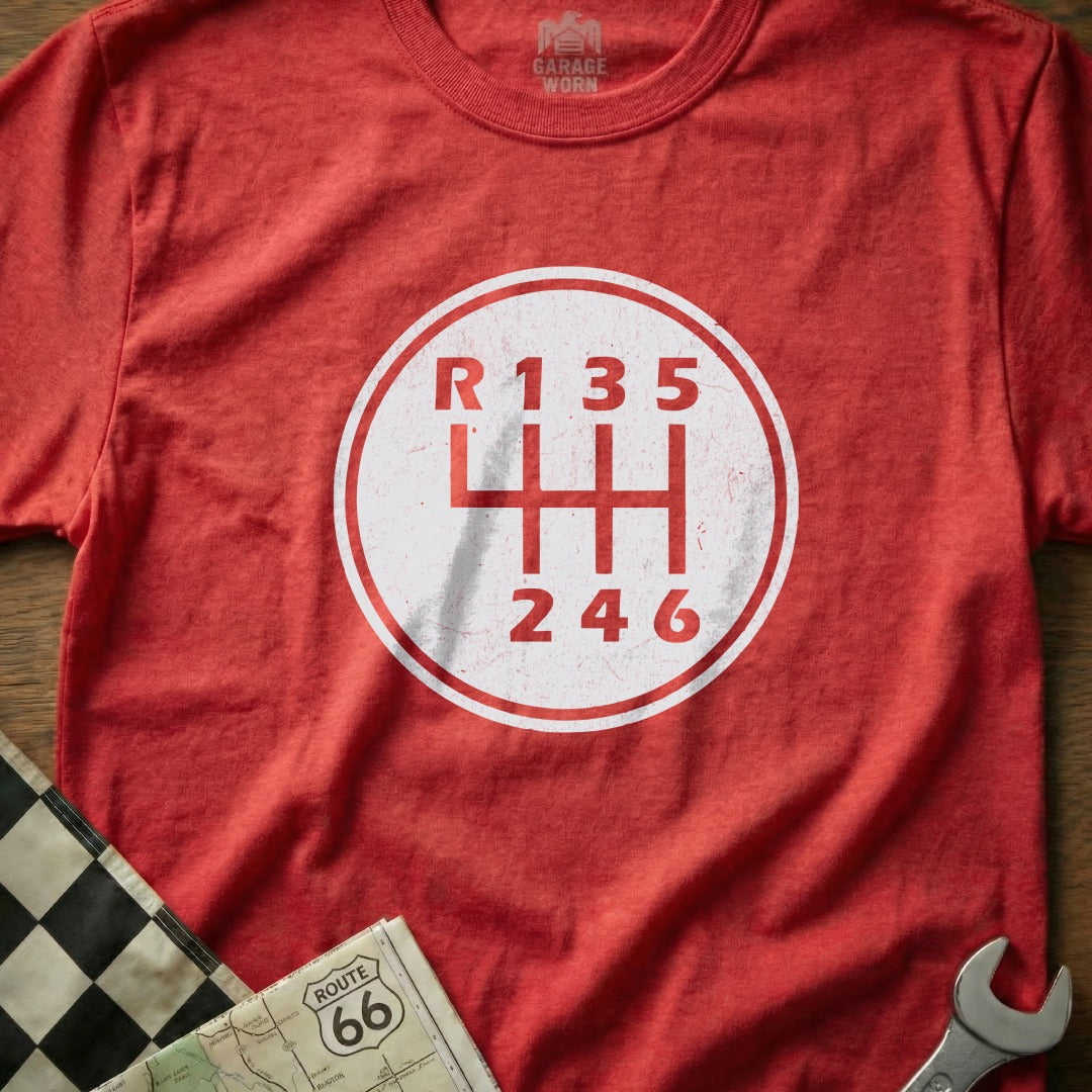 Red t-shirt with white circular gear shift pattern graphic and "R135 246" text.