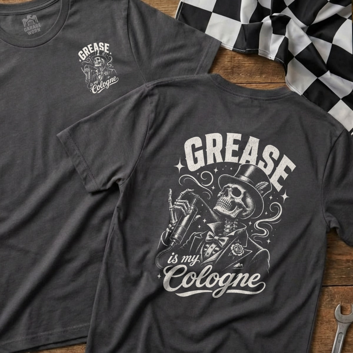 Dark grey t-shirt with skeleton graphic and text "GREASE is my Cologne".