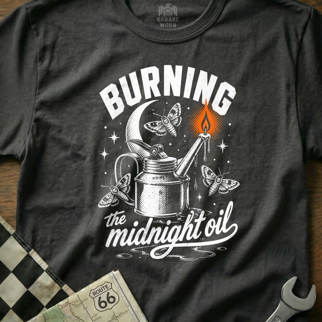 Burning the Midnight Oil t-shirt with moths, oil can, moon, and flame graphic.