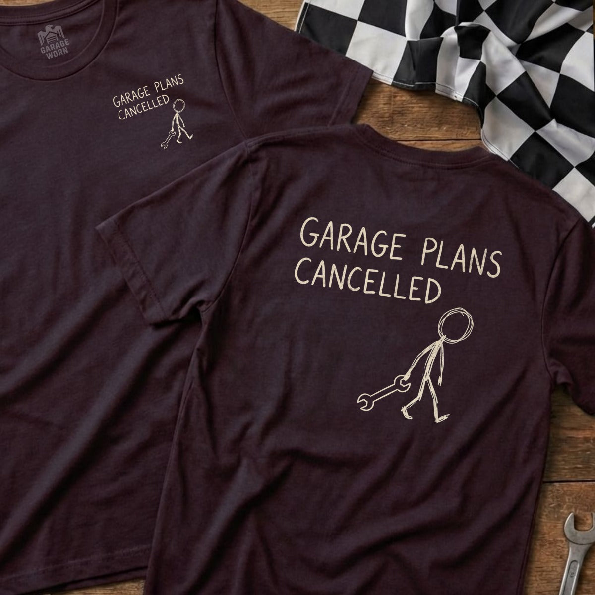 Burgundy t-shirt with "Garage Plans Cancelled" text and stick figure holding wrench.