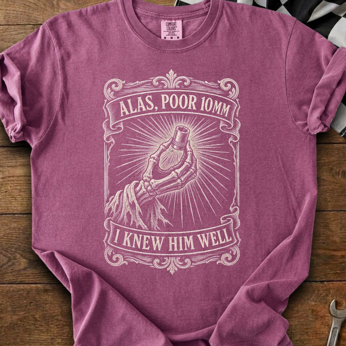 T-shirt with a skeleton hand holding a socket wrench with text "Alas, Poor 10mm I Knew Him Well".