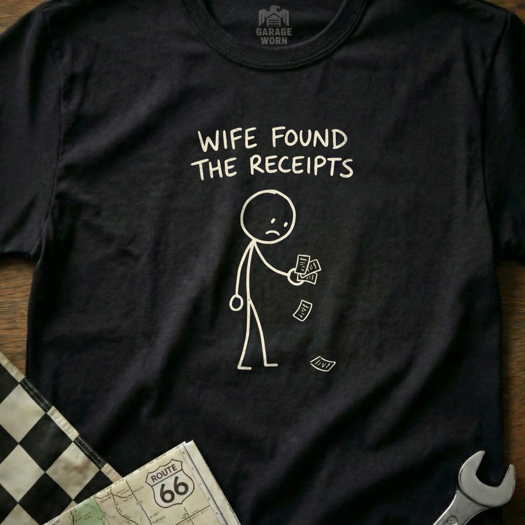 T-shirt with cartoon man holding receipts; text "WIFE FOUND THE RECEIPTS".