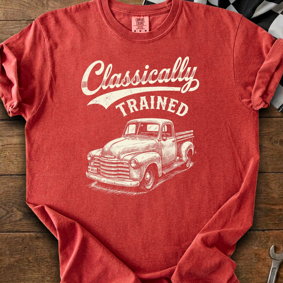Red t-shirt with "Classically Trained" text and vintage pickup truck graphic.