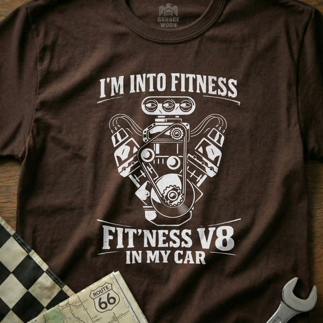Brown t-shirt with white graphic of V8 engine and text "FIT'NESS V8 IN MY CAR".