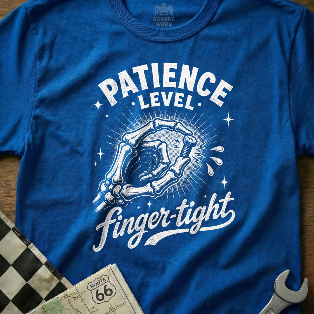 Blue t-shirt graphic with skeleton fingers holding a bolt, text "PATIENCE LEVEL" and "finger-tight".