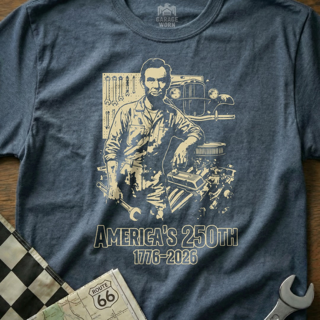 Abraham Lincoln and engine graphic on a t-shirt celebrating America's 250th anniversary.