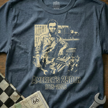 Abraham Lincoln and engine graphic on a t-shirt celebrating America's 250th anniversary.