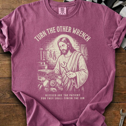 Jesus with a wrench working on an engine, "Turn The Other Wrench."