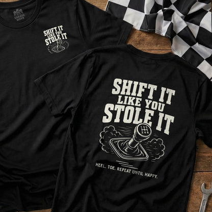 Black t-shirt with "Shift It Like You Stole It" and a gear shifter graphic.