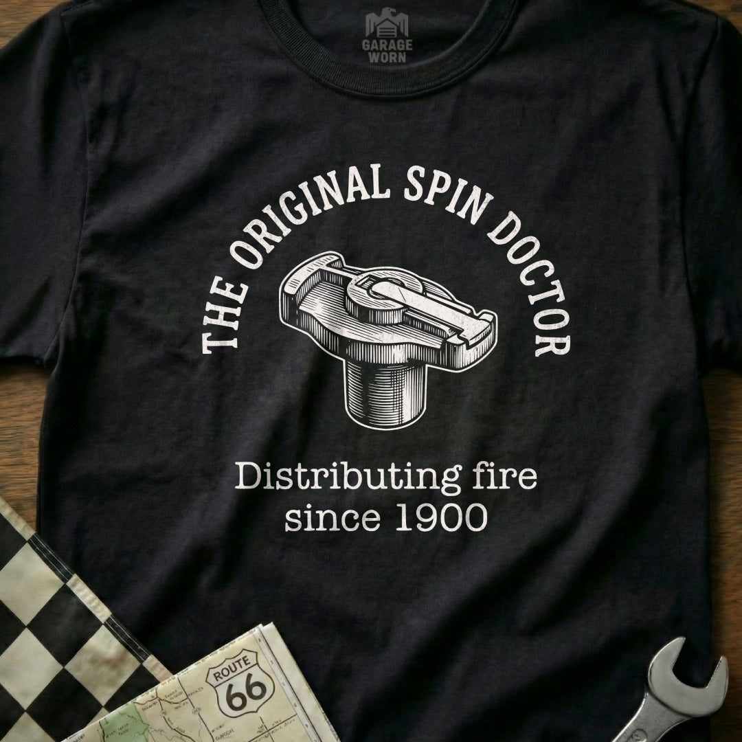 Black t-shirt with "The Original Spin Doctor" and distributor cap graphic.
