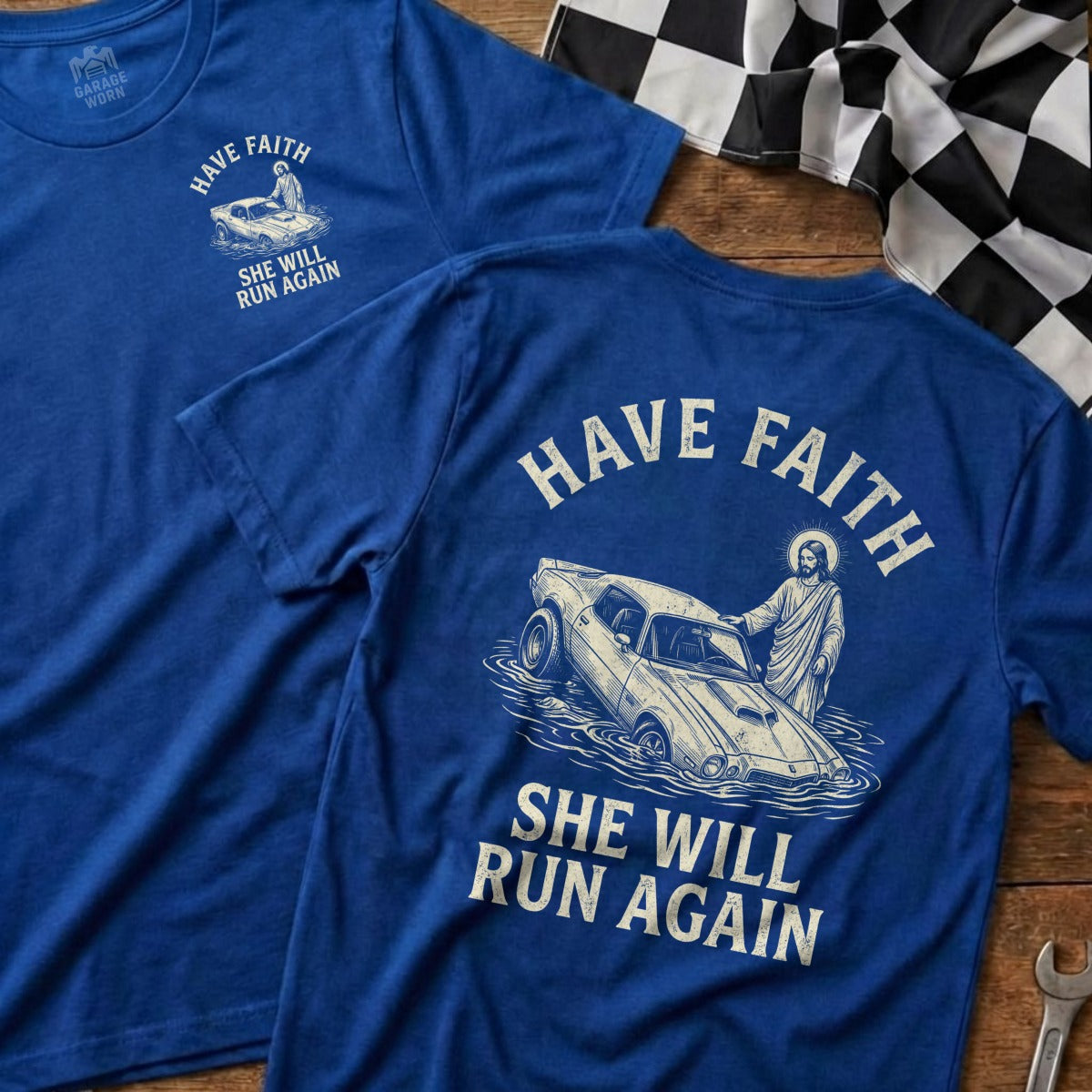 Blue t-shirt with "HAVE FAITH SHE WILL RUN AGAIN" and Jesus steering a muscle car.