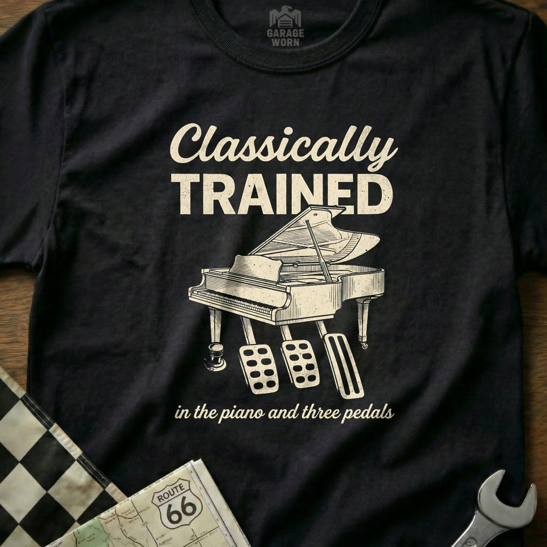 T-shirt with grand piano and text "Classically Trained in the piano and three pedals".