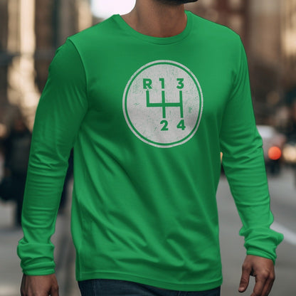 Green long-sleeve shirt with white circular gear shift graphic.