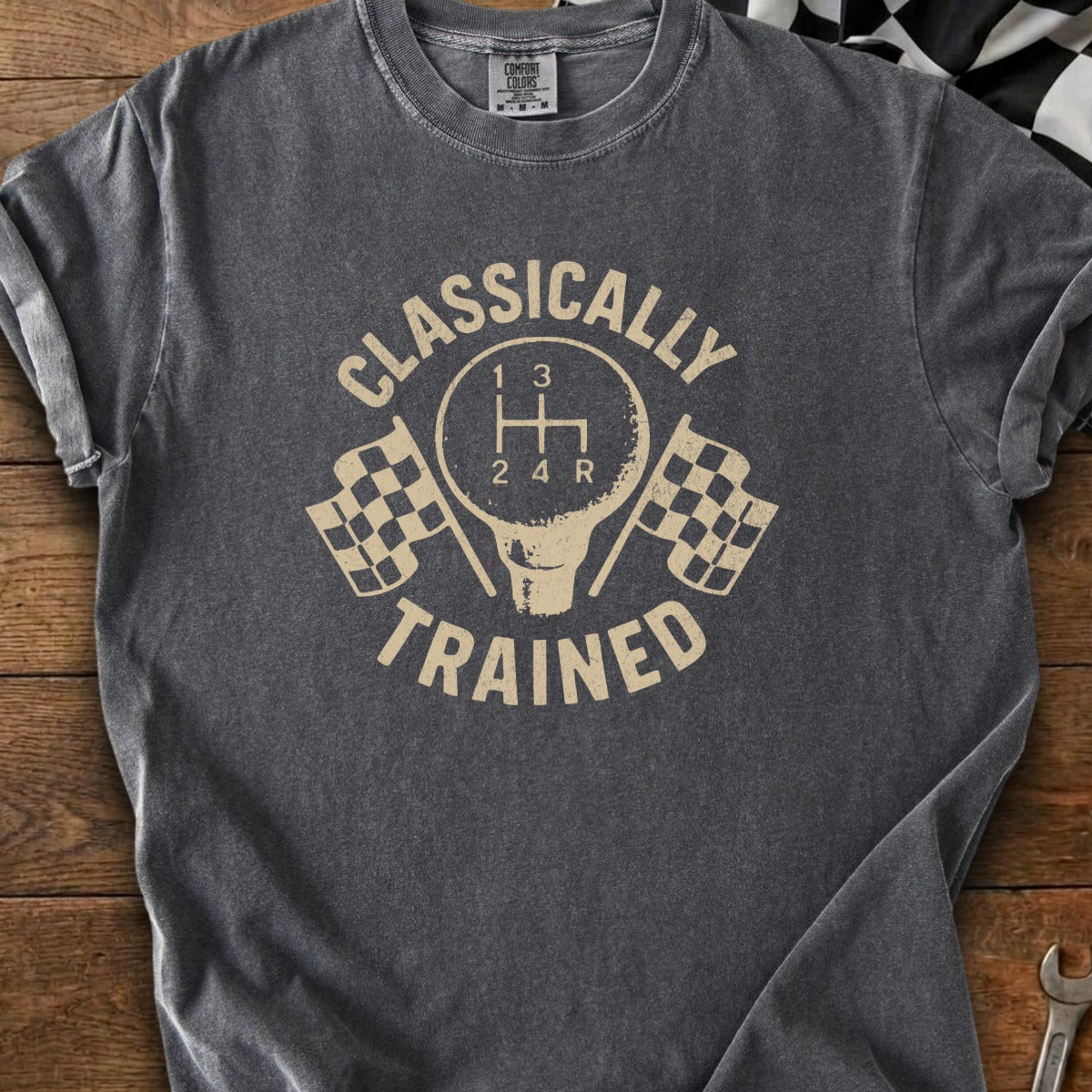 Grey t-shirt with "Classically Trained" text and a vintage shift knob design.