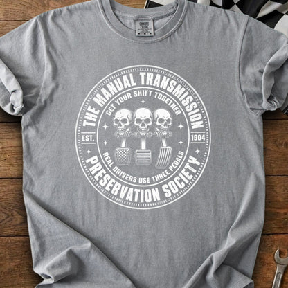 Grey t-shirt with "The Manual Transmission Preservation Society" graphic.