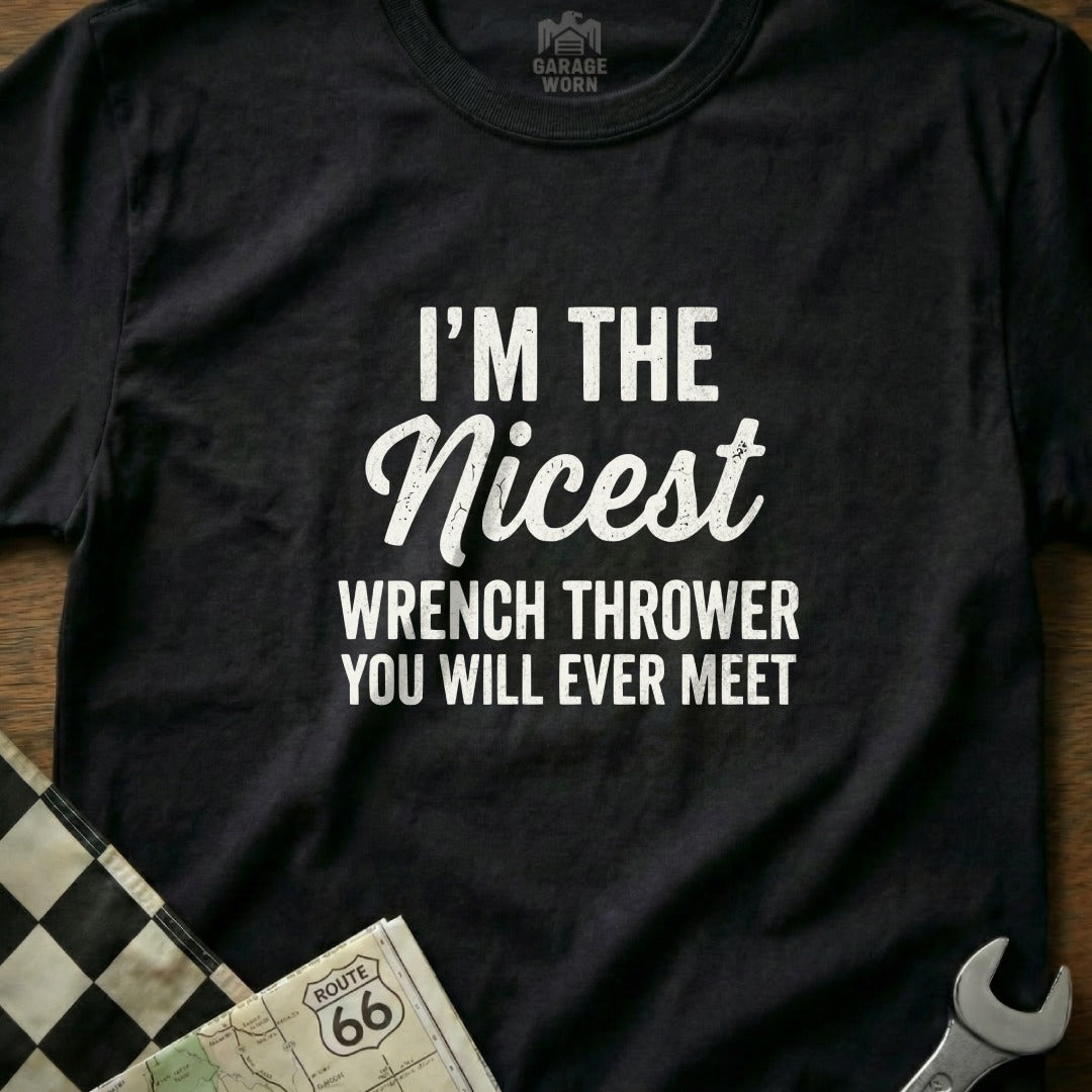 Black t-shirt with white text "I'm the Nicest Wrench Thrower You Will Ever Meet".