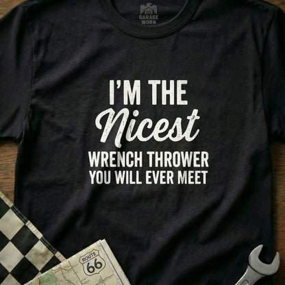 Black t-shirt with white text "I'm the Nicest Wrench Thrower You Will Ever Meet".