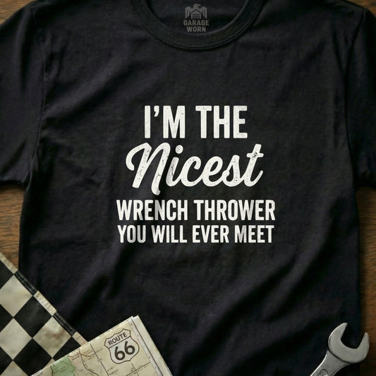Black t-shirt with white text "I'm the Nicest Wrench Thrower You Will Ever Meet".