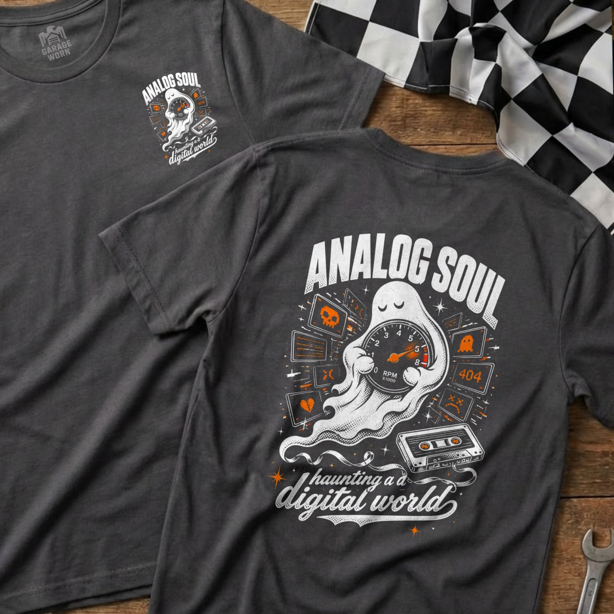 Dark gray t-shirt with ghost, speedometer, cassette, and skulls graphic, reading "Analog Soul".