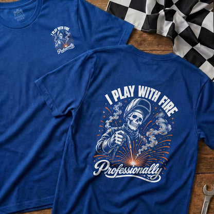 Blue t-shirt with skeleton welder graphic and text "I PLAY WITH FIRE Professionally".