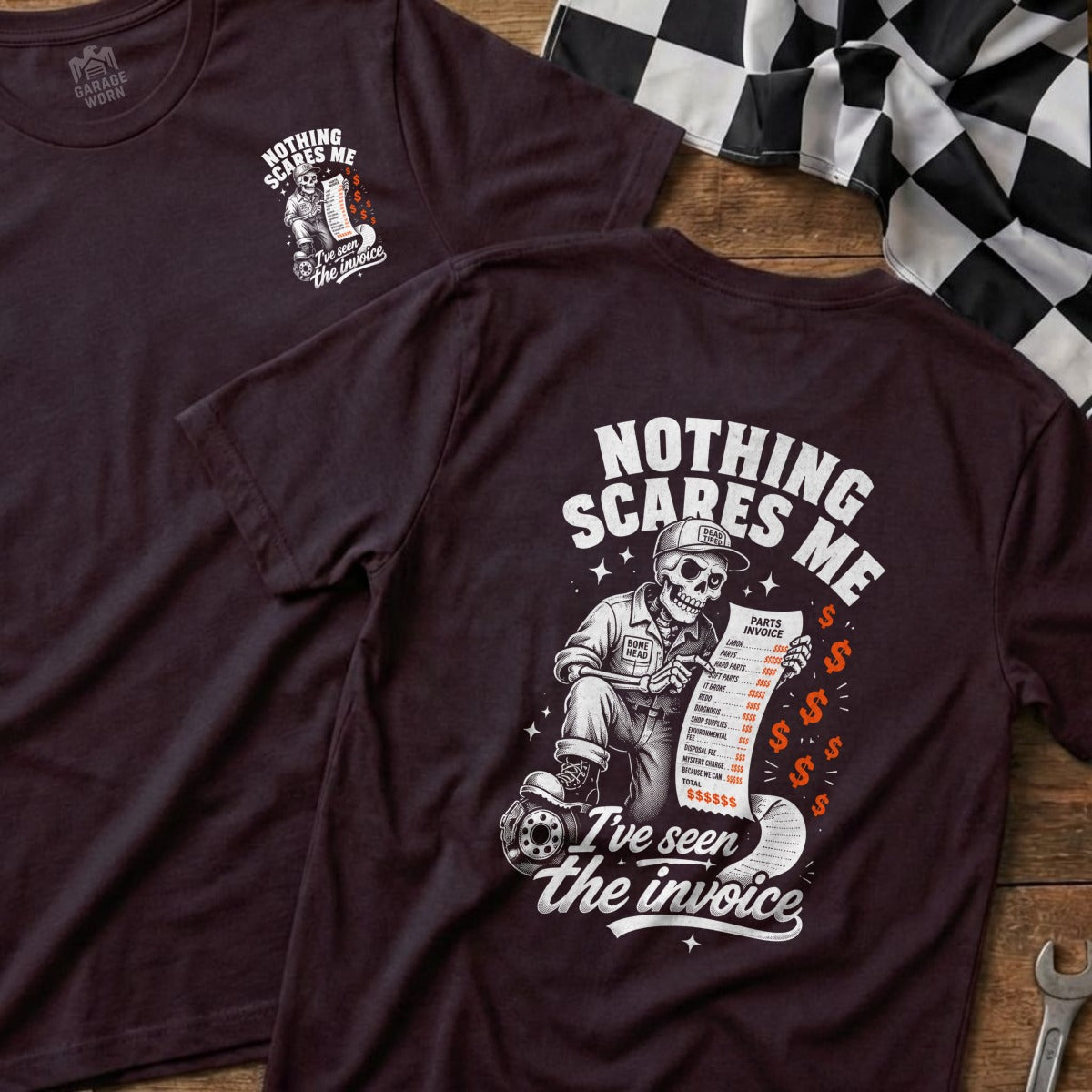 Dark t-shirt with skeleton holding an invoice and "Nothing scares me" text.