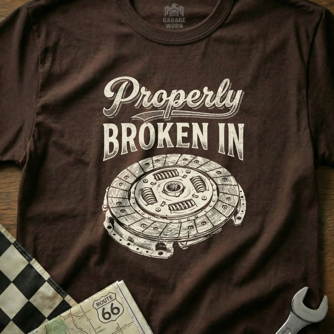 T-shirt with "Properly Broken In" text and a clutch assembly graphic.