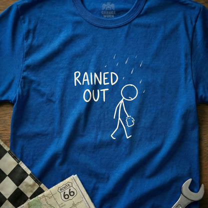 Blue t-shirt with stick figure under rain and "Rained Out" text.