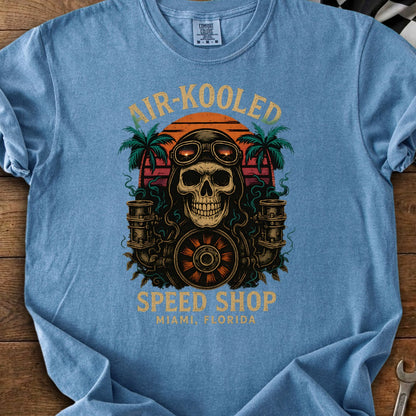 Skull wearing goggles with "Air-Kooled Speed Shop Miami, Florida" text.