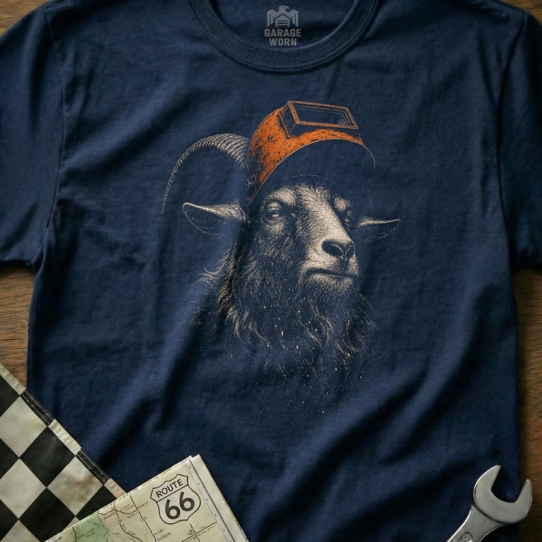 Navy t-shirt with a black goat wearing a welding mask graphic.